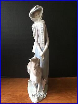 Lladro Lady Walking Dog Figurine