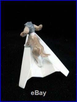 Lladro Let's Fly Away #6665 Dog on Paper Airplane Porcelain Figurine