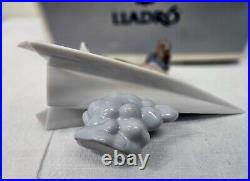 Lladro Let's Fly Away Dog on Airplane #6665 with Original Box and Papers