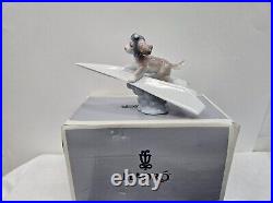 Lladro Let's Fly Away Dog on Airplane #6665 with Original Box and Papers