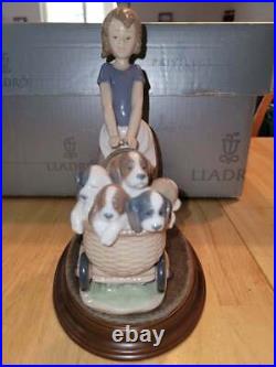 Lladro Litters of Love #5364 Girl with dogs stroller
