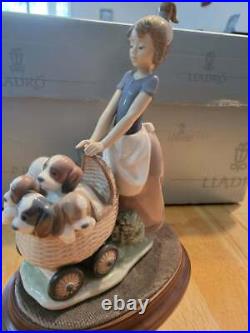 Lladro Litters of Love #5364 Girl with dogs stroller