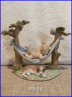 Lladro Little Napmates #6853 baby hammock dog
