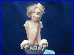 Lladro Little Pals, boy/clown w dogs in pockets #7600 Collector Soc, 9 mint