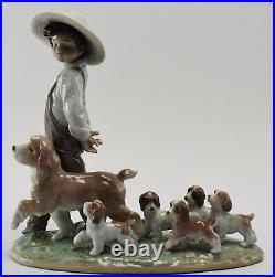 Lladro MY LITTLE EXPLORERS (Boy Walking Dogs) #6828 KB3