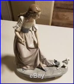 Lladro NAO 1987 Lets play Lady in pink with dog tugging dress Figurine
