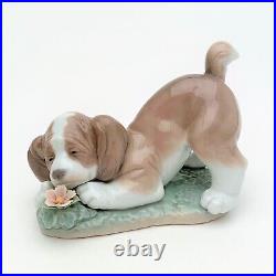 Lladro Porcelain #6832 A Sweet Smell Dog with Flower Figurine