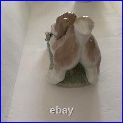 Lladro Porcelain #6832 A Sweet Smell Dog with Flower Figurine