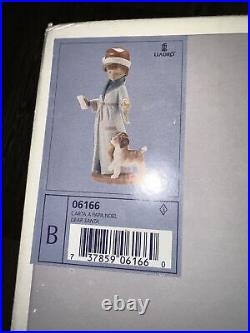 Lladro Porcelain Figurine 6166 Dear Santa Boy Playing with Dog Santa Hat