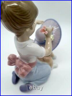 Lladro Porcelain Figurine An Elegant Touch 6862 Girl Putting Flower on Dog's Hat