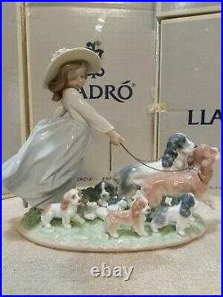 Lladro Puppy Parade #6784 Girl withdogs walking leash