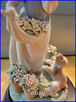 Lladro Romp in the Garden #6907 Girl with dogs flowers