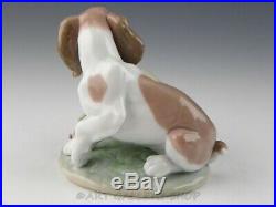 Lladro Society Figurine IT WASN'T ME! DOG WITH FLOWERS #7672 Retired Mint Box