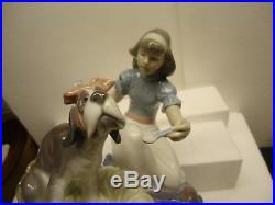 Lladro Take Your Medicine girl and dog #5921, 7 x 7 1/2 mint
