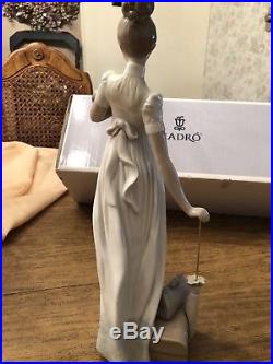 Lladro Traveling Companions. Lady With Dog