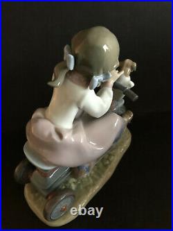 Lladro Travelling In Style. 5680. Girl with puppies