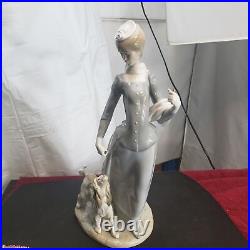 Lladro Woman With Dog Porcelain Figurine Size 10.5 In Multicolor