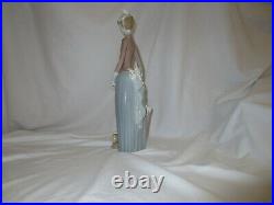 Lladro Woman with Umbrella and Dog Figurine # 4761