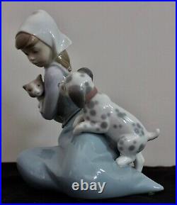 Lladro Young Girl with Cat + Dog. No 5032. Sculpted by Juan Huerta. Dated 1978