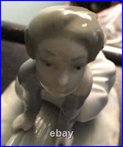 Lladro, authentic Boy and Girl with Dog on Seesaw, glossy figurine