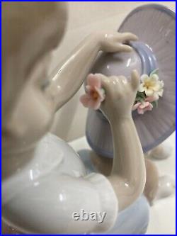 Lladro figurine #6862 An Elegant Touch Young girl dressing a dog