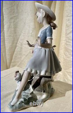 Lladro figurine Girl with flowers and dog