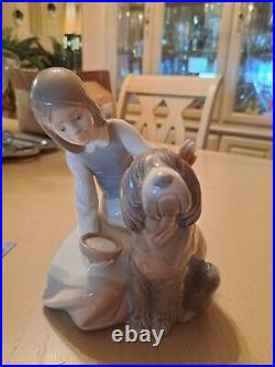 Lladro figurine girl feeding old English Sheepdog from the bowl glazed finish