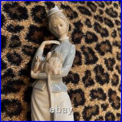 Lladro figurine girl with dog