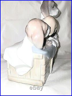 Lladro figurine retired Puppies in Basket