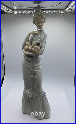 Lladro figurine tall Woman Walking with Dog holding small dog & umbrella 4893