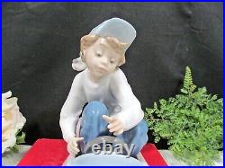 Lladro porcelain figurine Out for a Spin #5770 boy with Dog puppy made in Spain