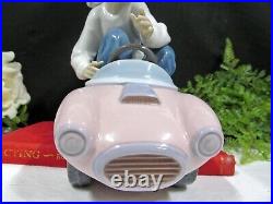 Lladro porcelain figurine Out for a Spin #5770 boy with Dog puppy made in Spain