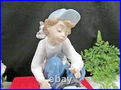 Lladro porcelain figurine Out for a Spin #5770 boy with Dog puppy made in Spain