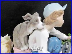 Lladro porcelain figurine Out for a Spin #5770 boy with Dog puppy made in Spain