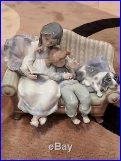 Mint condition Lladro figurine Big Sister Sister and brother on couch with dog
