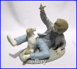 NAO by LLADRO SPAIN FIGURINE BOY AND DOG SIT UP