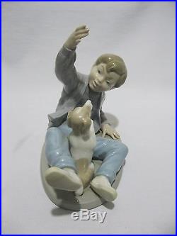 NAO by LLADRO SPAIN FIGURINE BOY AND DOG SIT UP