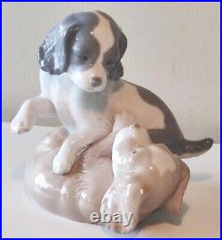 NAO by Lladro Two Dogs Playing Figurine. Moving