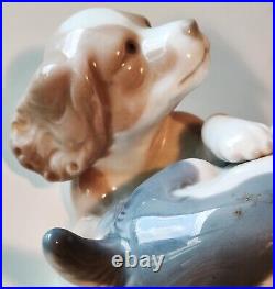 NAO by Lladro Two Dogs Playing Figurine. Moving