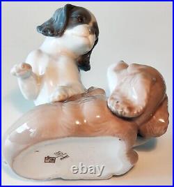 NAO by Lladro Two Dogs Playing Figurine. Moving