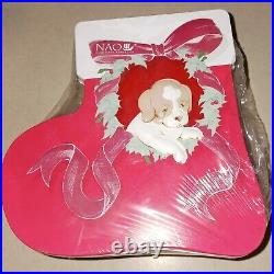 Rare SEALED Nao by Lladro Puppy's Christmas. Dog opening stocking. RETIRED 7427