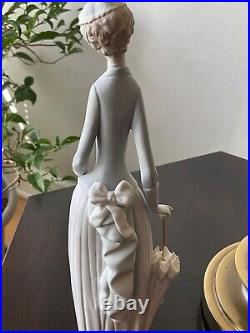 Retired Lladro Lady withdog and withparasol #4761