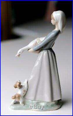 Two Lladro 4866, Lladro 5008,'Girl with Goose and Dog','The Dreamer Girl