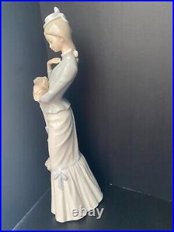 Vintage Lladro A walk with the dog Figurine