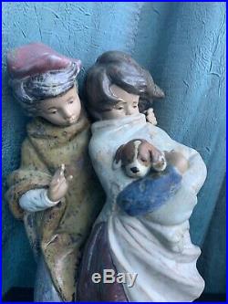 Vintage Lladro Boy And Girl Holding a Dog, 14 tall