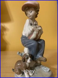 Vintage lladro figurine of a Boy and his dog by Antonio Ramos