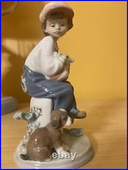 Vintage lladro figurine of a Boy and his dog by Antonio Ramos