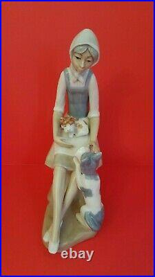 Vintage lladro''seconds'' porcelain figurine girl with dogs 10 1/2'' tall