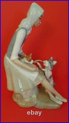 Vintage lladro''seconds'' porcelain figurine girl with dogs 10 1/2'' tall