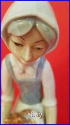 Vintage lladro''seconds'' porcelain figurine girl with dogs 10 1/2'' tall
